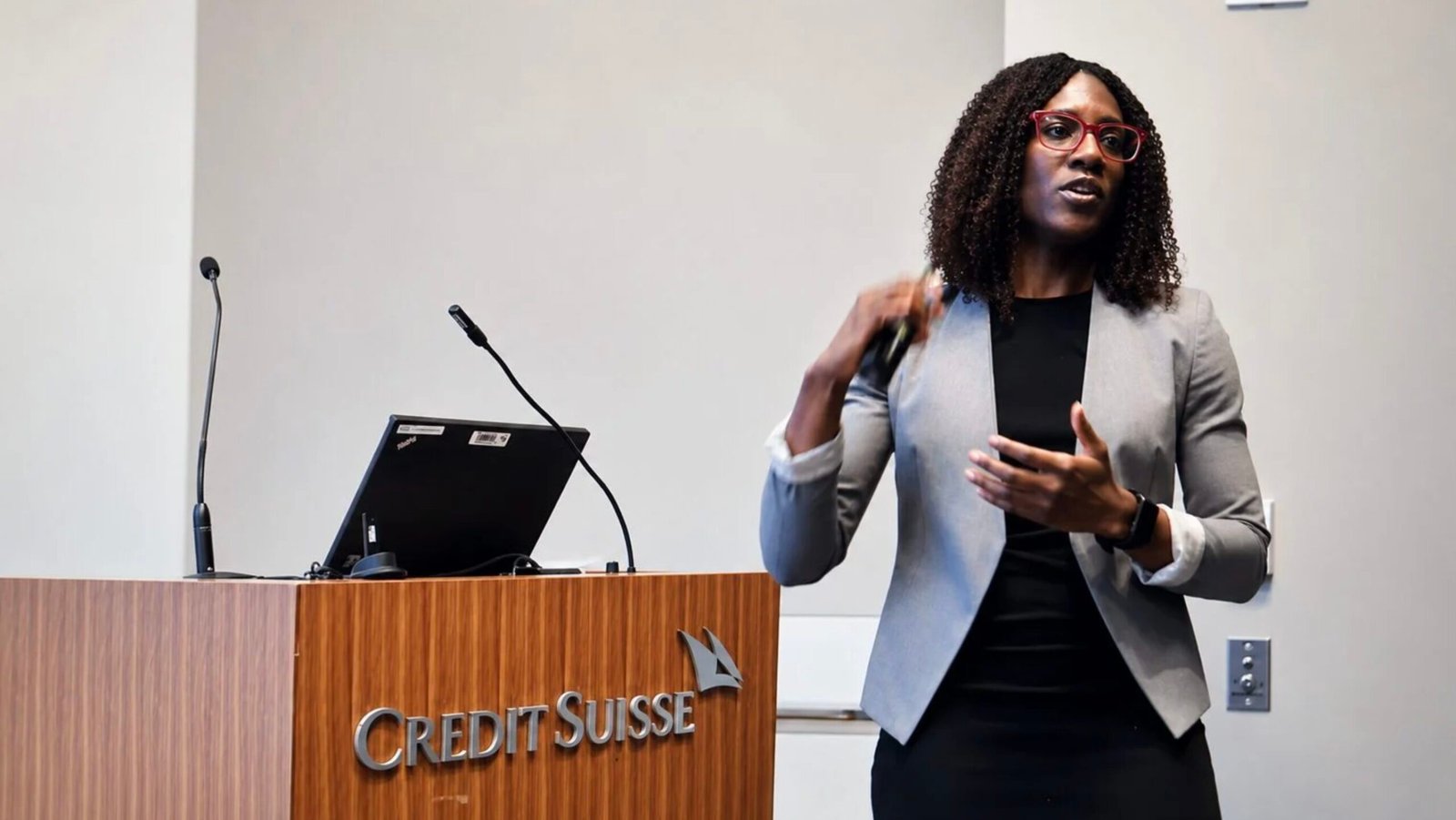 Christina Massalay Presenting at Credit Suisse Christina Massalay delivering a financial presentation at a Credit Suisse event.