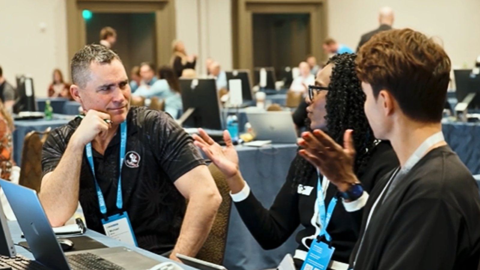 Christina Massalay participating in a discussion with fellow financial professionals at the Orion Conference.