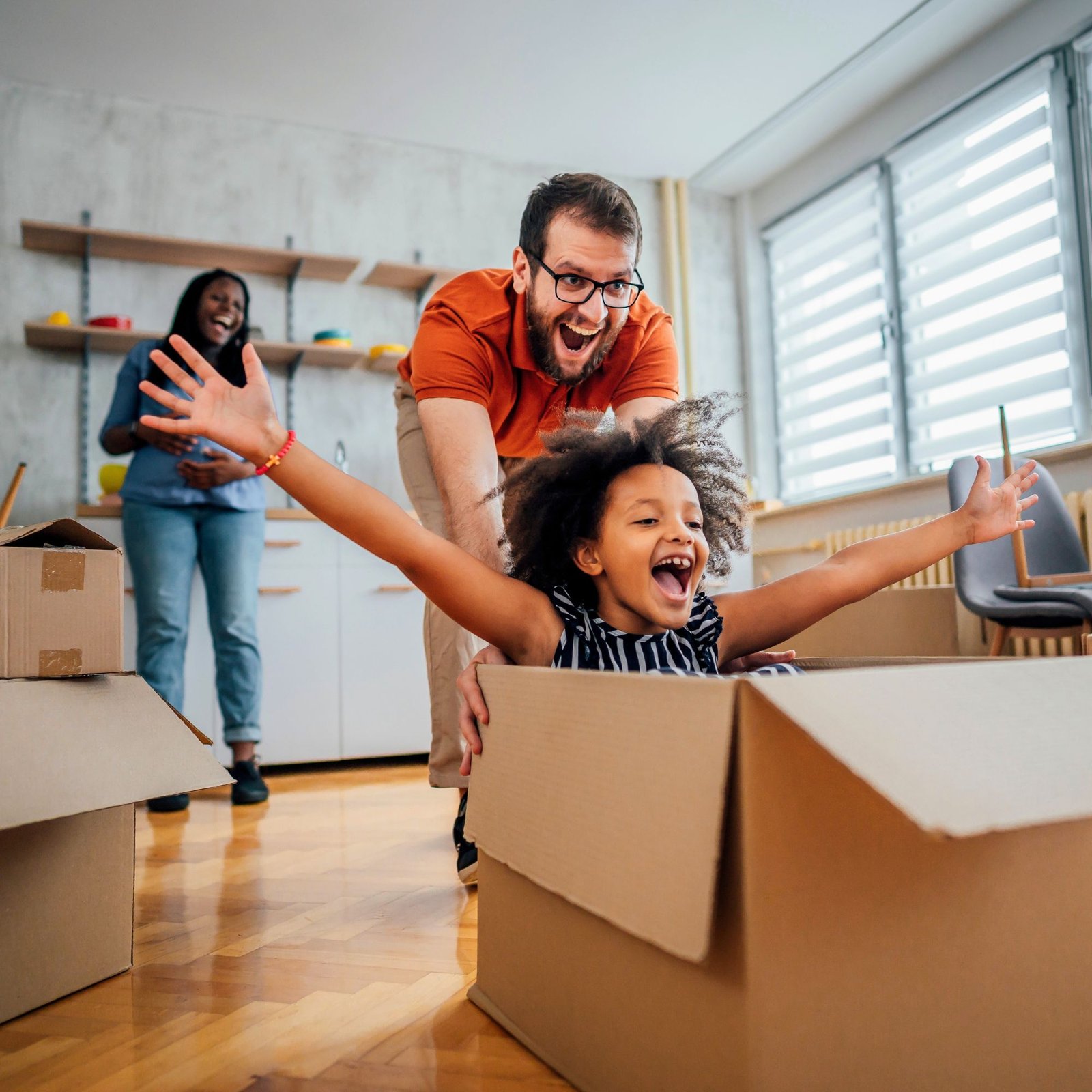 Family enjoying a new beginning together while planning for their financial future with personalized financial guidance.